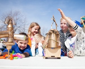 kids smiling with river hero trophies