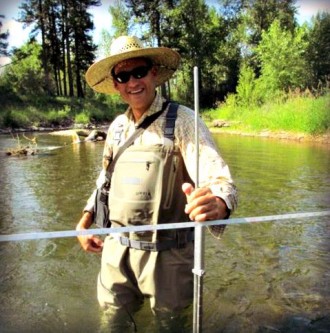 Jed whiteley clark fork coalition staff measuring flows in lolo creek II