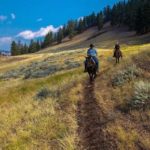 Horseback riding in beautiful countryside at E Bar L Ranch
